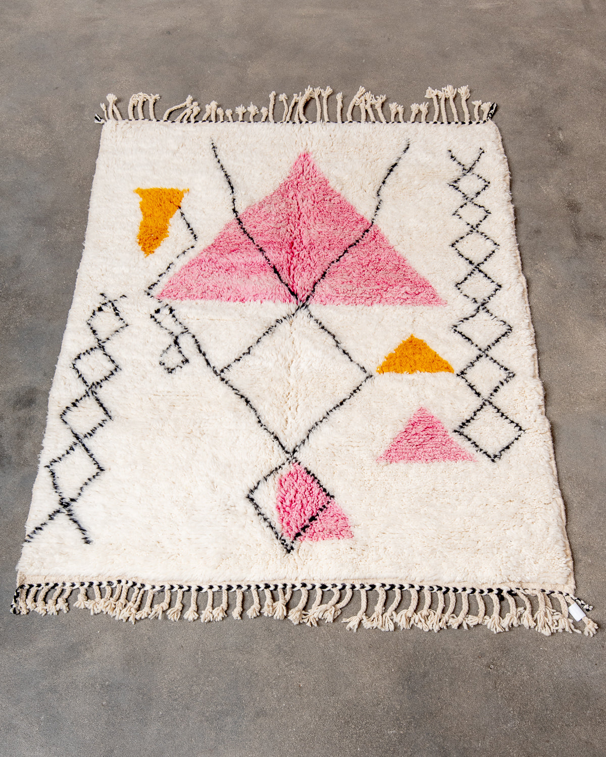 Modern, designer, handcrafted Berber rug from Morocco. Beniourain carpet with beautiful colours and patterns and fluffy wool texture.